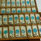 A volunteer holds sputum samples from tuberculosis patients at the Indonesian Union Against Tuberculosis clinic in Jakarta